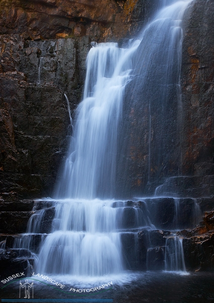 slides/Unknown Falls, Sutherland.jpg sutherland,scotland,highlands,rain,waterfall,red rocks Unknown Falls, Sutherland